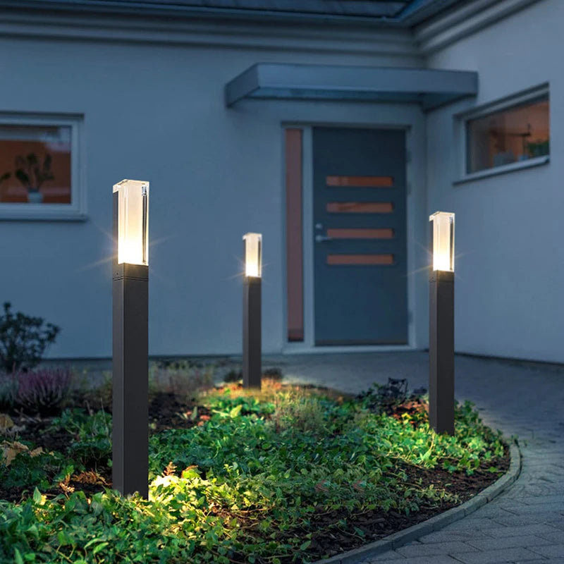 Path lights in front of a modern home