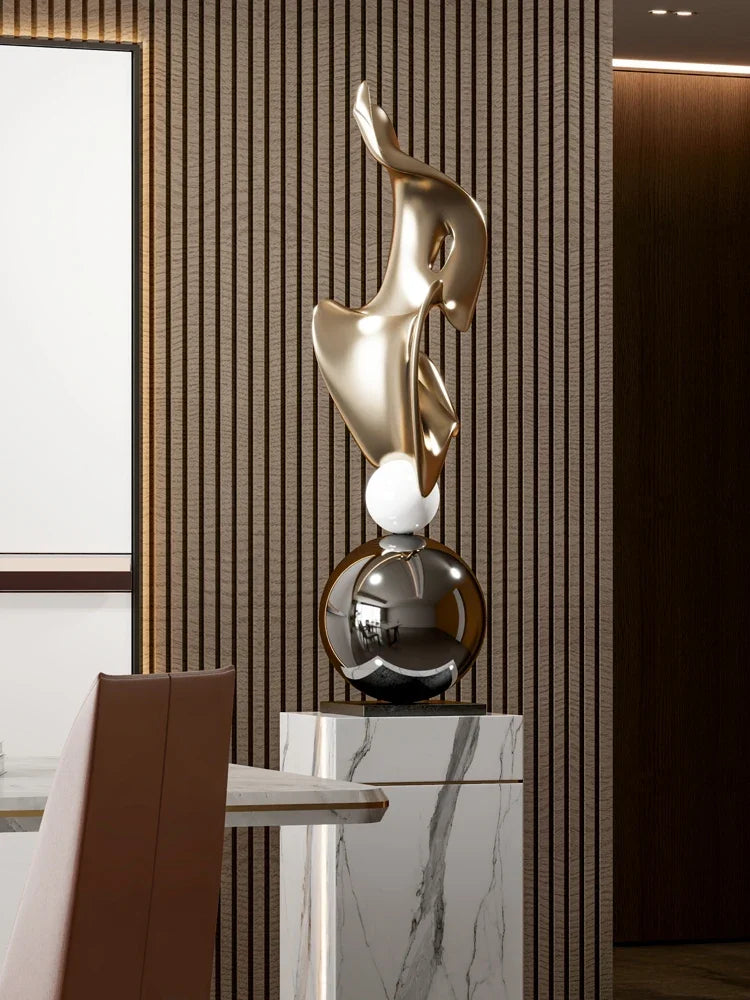 Aura Electroplated Floor Sculpture at night