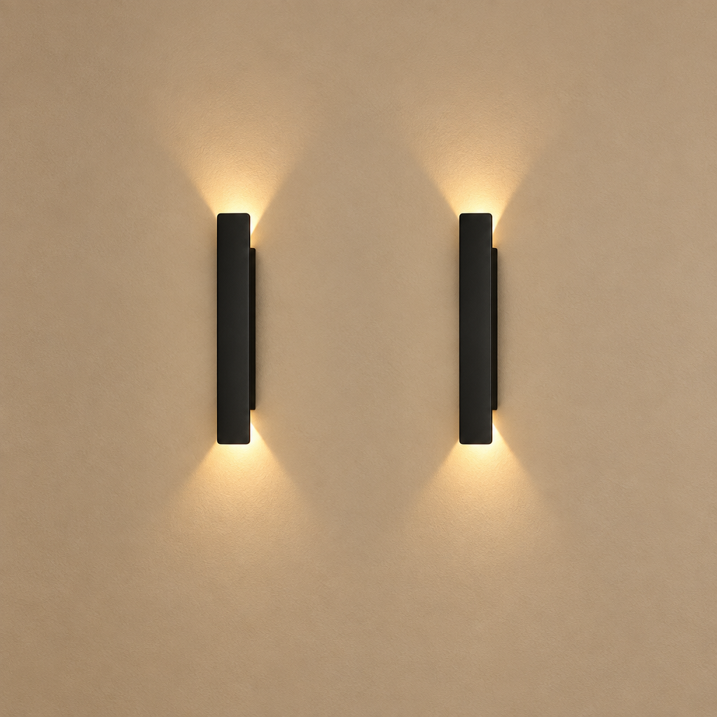 Arden Up/Down Bar Wall Light on warm beige plaster wall with soft studio lighting