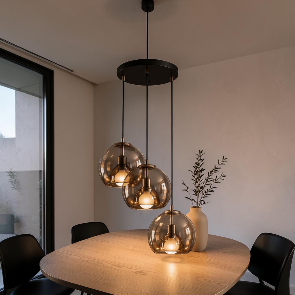 Nebula smoked glass cluster pendant light over a round oak dining table in a modern home