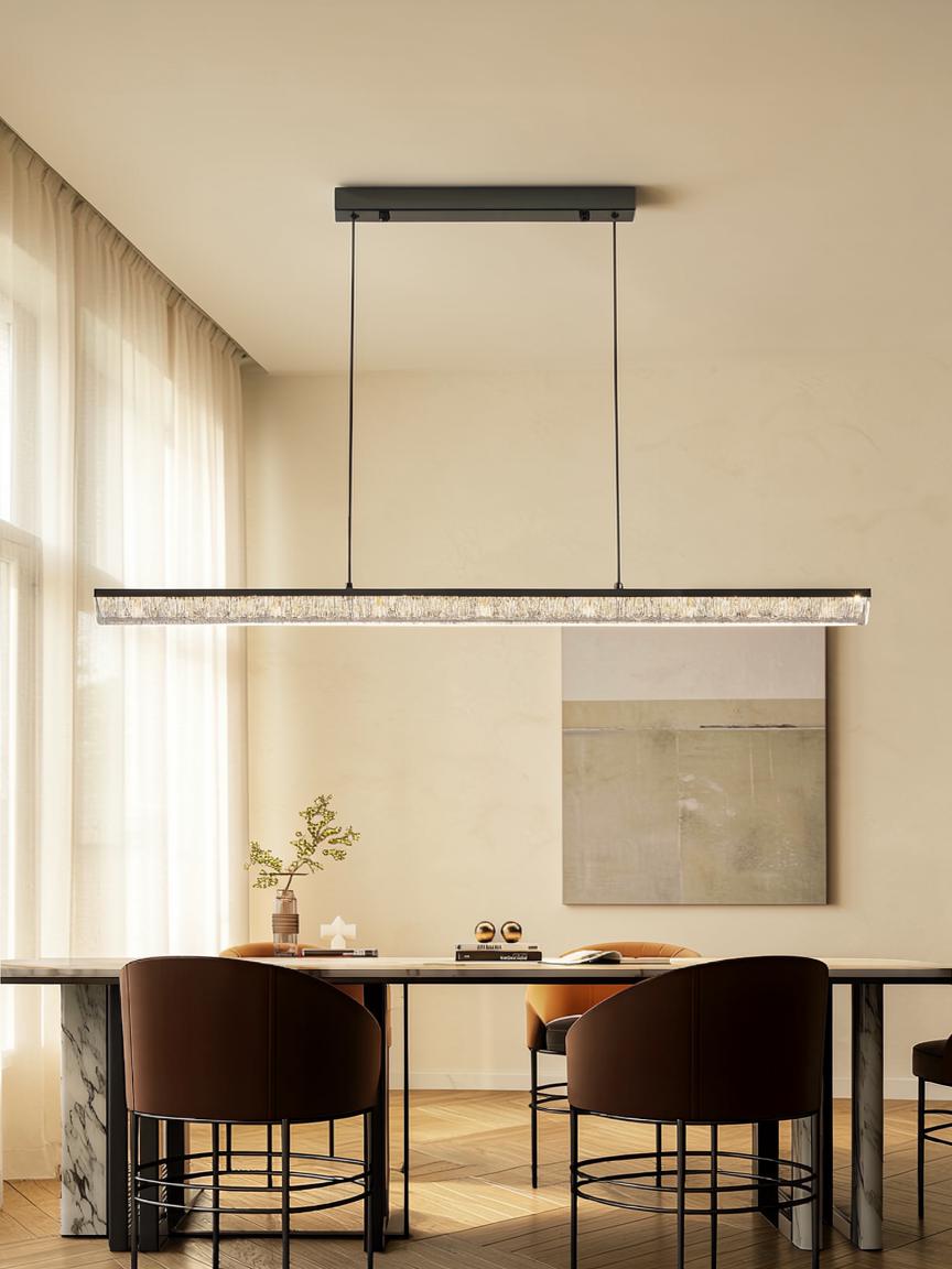 Vista linear pendant light over a dining table in a bright modern dining room